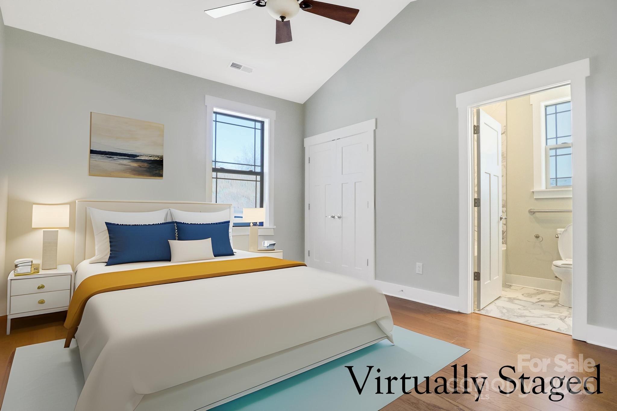 4 Brookstone Place Candler, NC 28715 - Photo 12 of 31 a bedroom with a large bed and a window