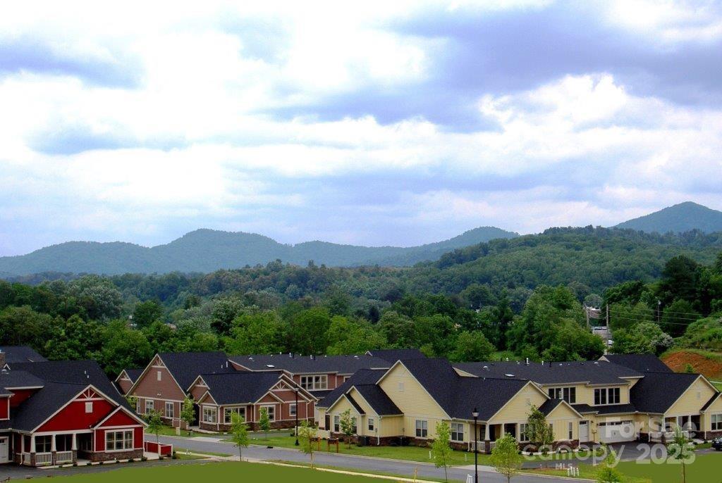 4 Brookstone Place Candler, NC 28715 - Photo 22 of 31 an aerial view of a house