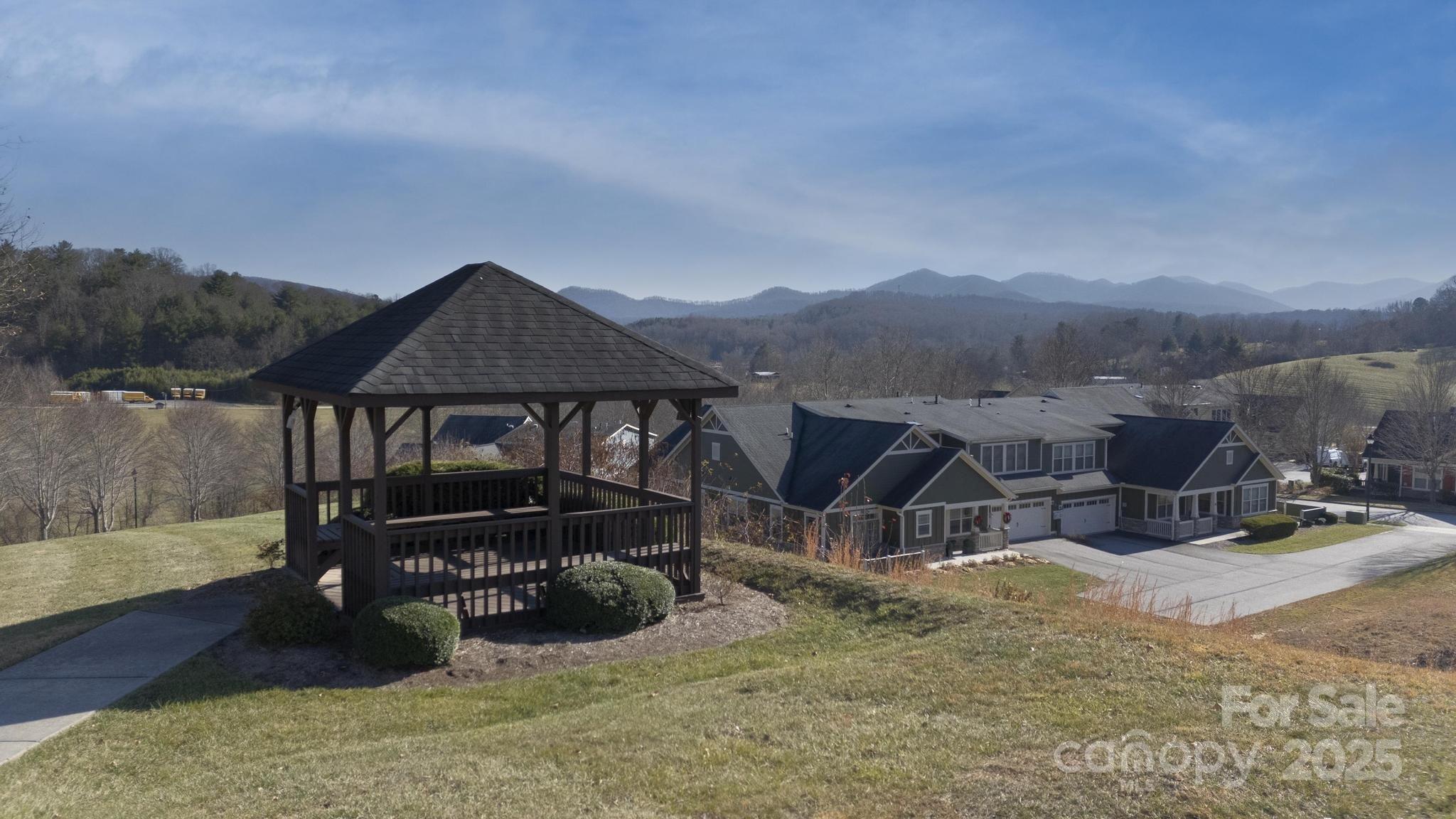 4 Brookstone Place Candler, NC 28715 - Photo 29 of 31 a view of a house with yard and sitting area