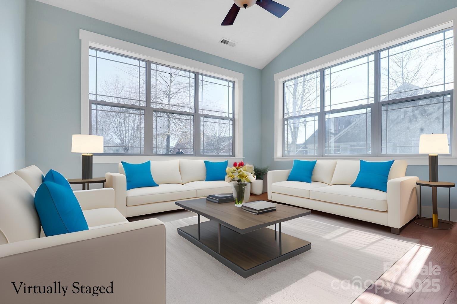 4 Brookstone Place Candler, NC 28715 - Photo 4 of 31 a living room with furniture and a large window