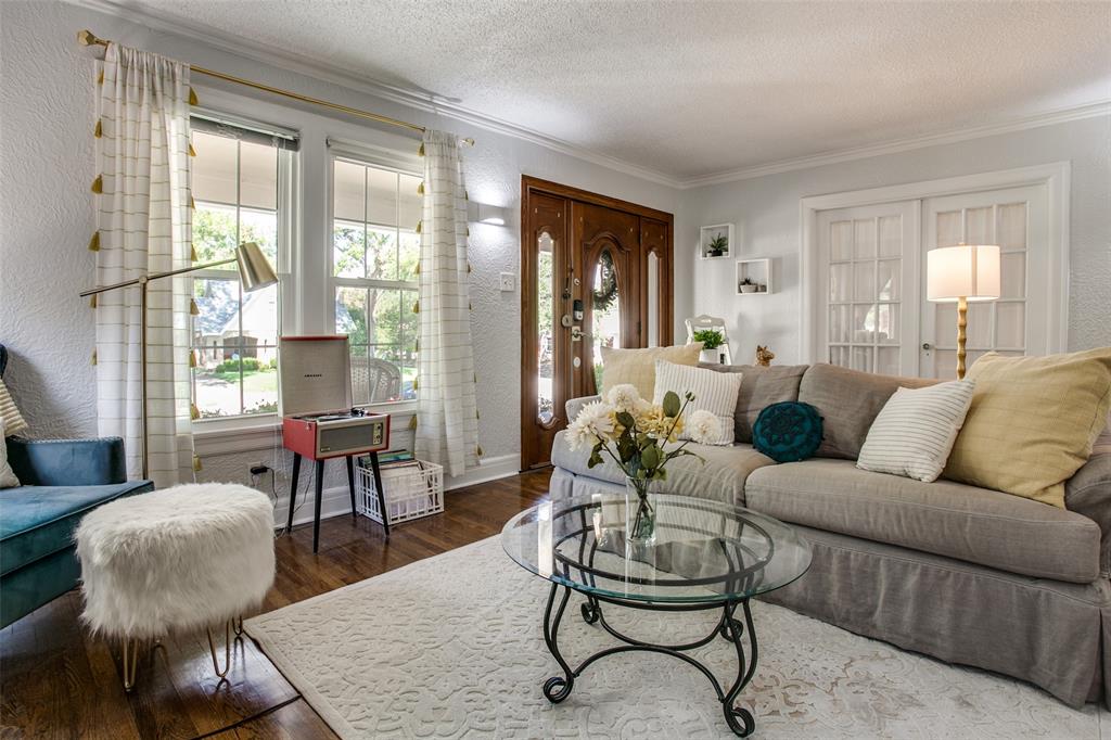 3005 6th Avenue Fort Worth, TX 76110 - Photo 3 of 18 a living room with furniture and a large window