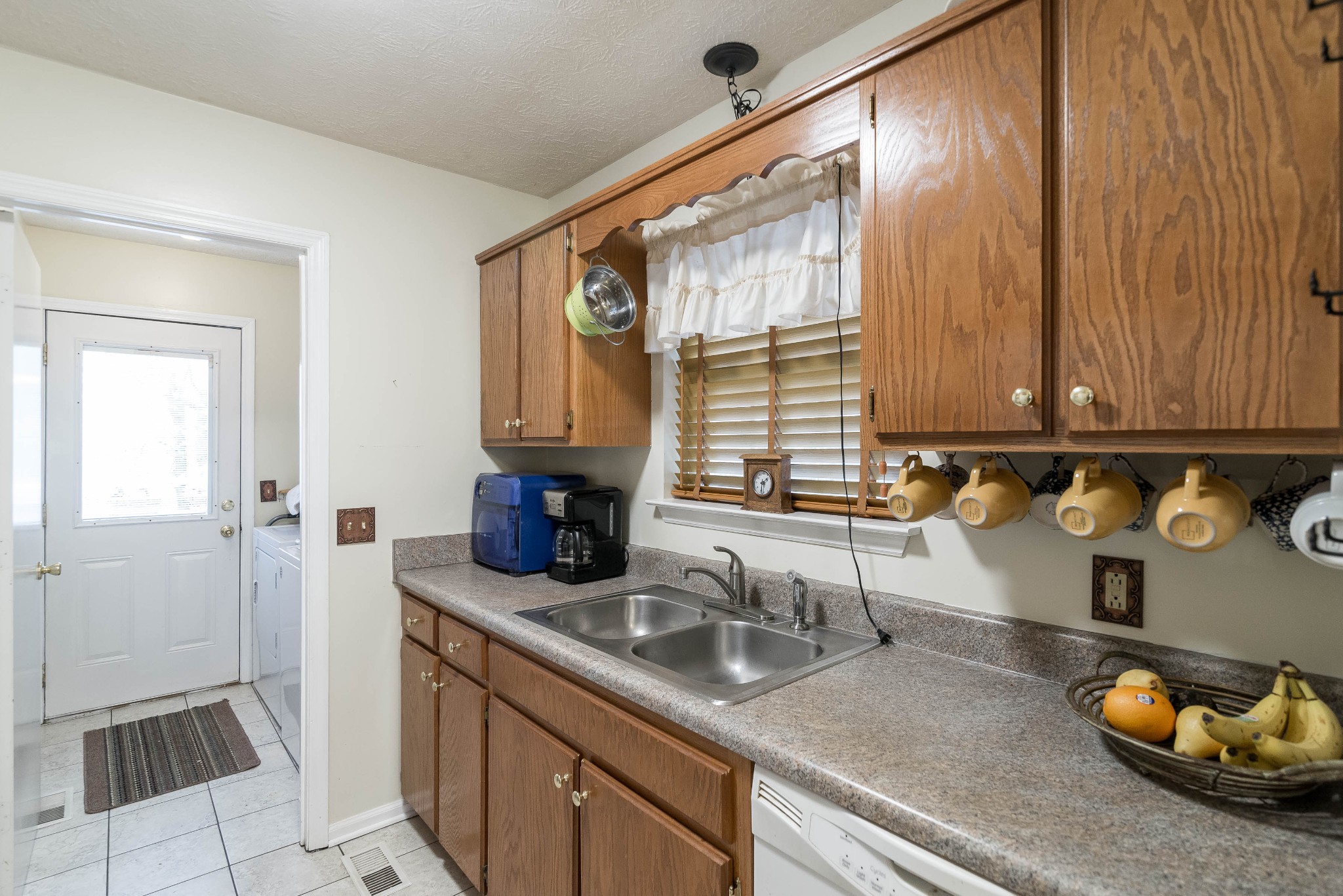 104 Brookside Point Springfield, TN 37172 - Photo 11 of 28 a kitchen with stainless steel appliances a sink a stove and cabinets