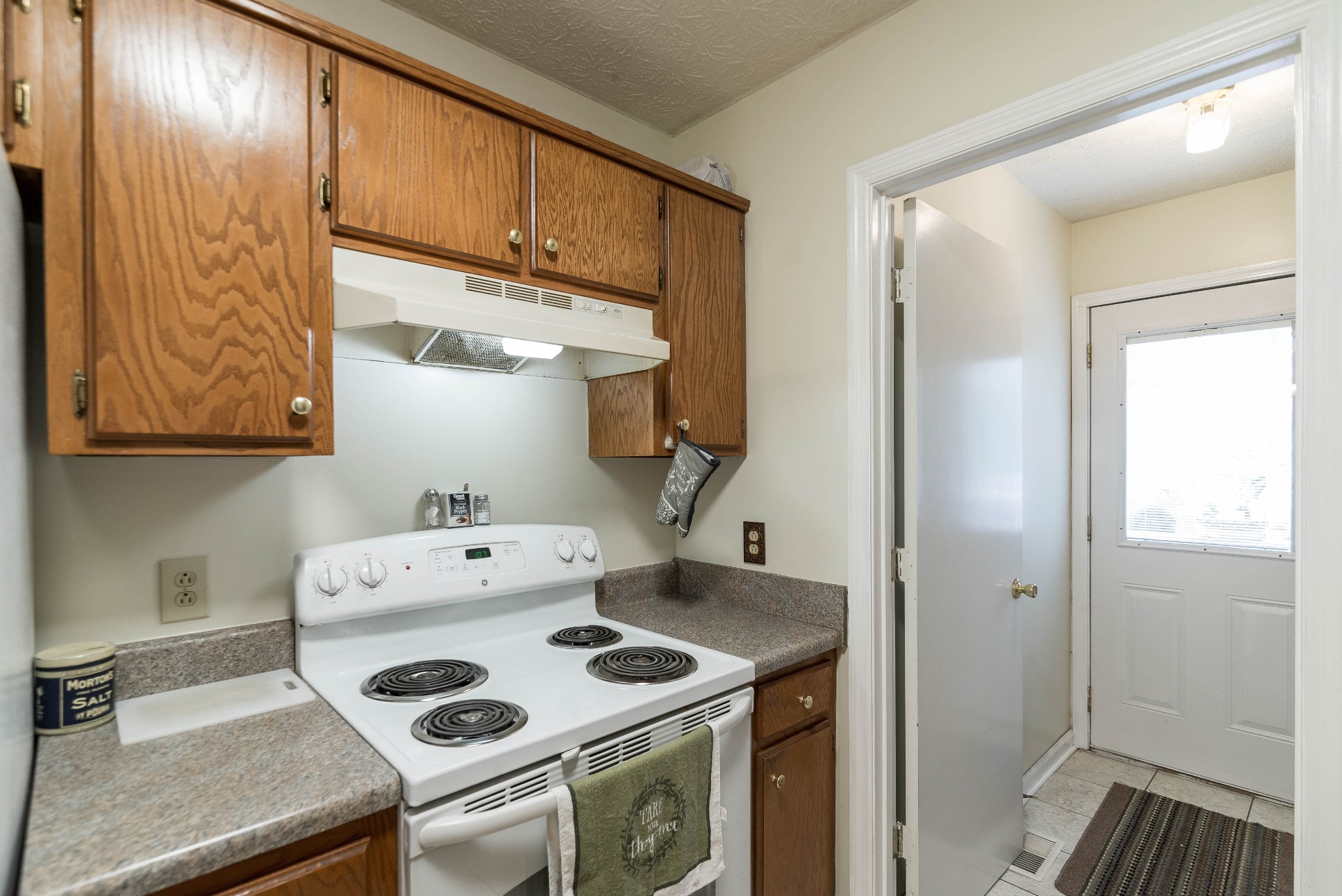 104 Brookside Point Springfield, TN 37172 - Photo 12 of 28 a kitchen with a stove and a refrigerator