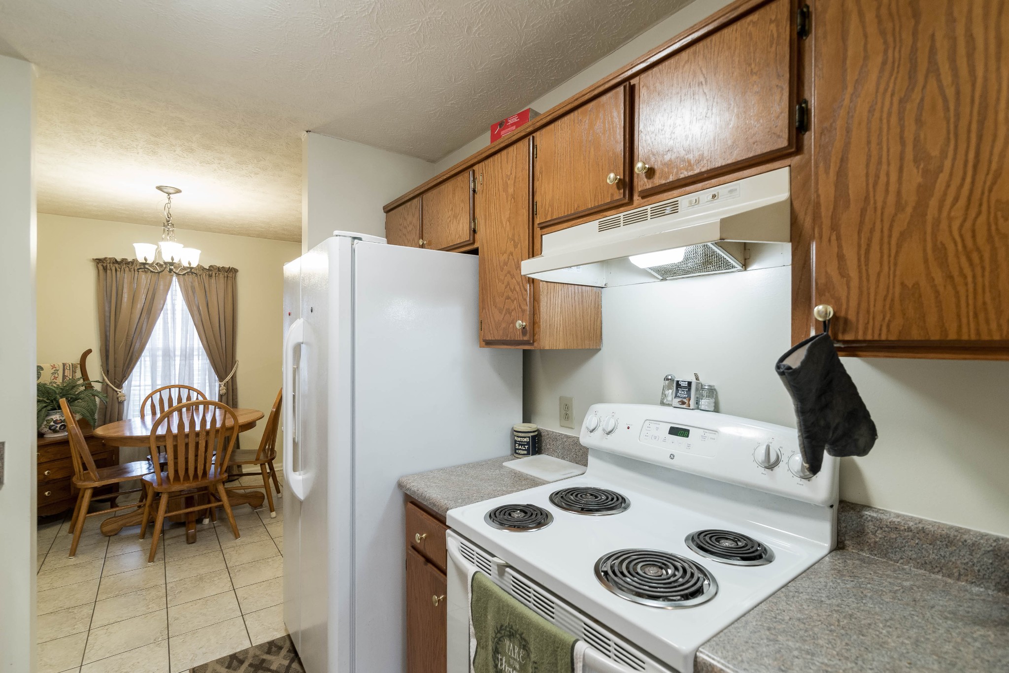 104 Brookside Point Springfield, TN 37172 - Photo 14 of 28 a kitchen with a stove and a refrigerator