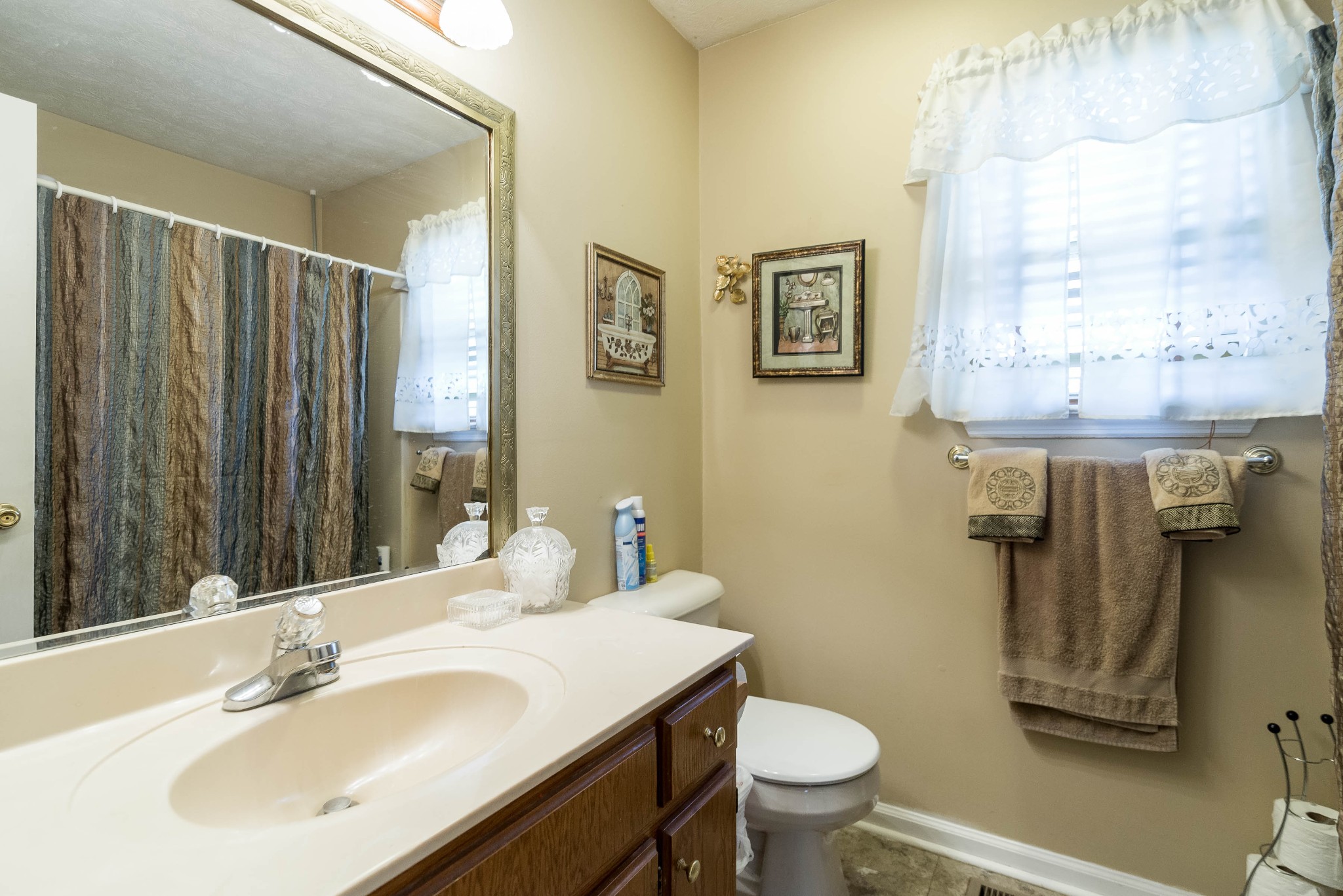 104 Brookside Point Springfield, TN 37172 - Photo 24 of 28 a bathroom with a sink toilet and shower