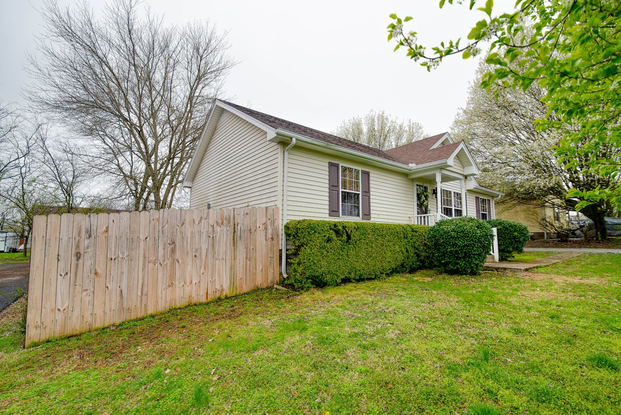 104 Brookside Point Springfield, TN 37172 - Photo 3 of 28 a view of a house with backyard and trees