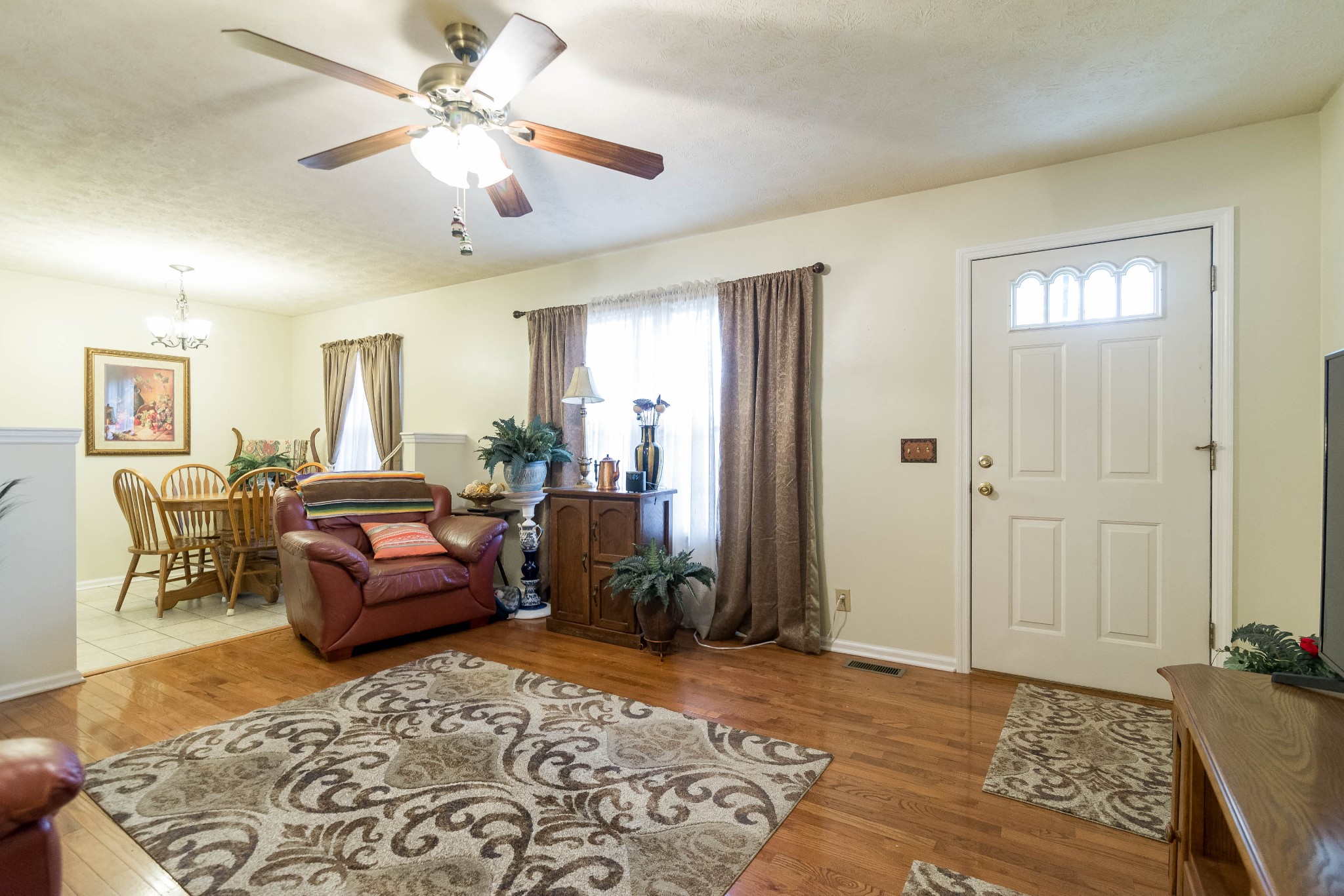 104 Brookside Point Springfield, TN 37172 - Photo 6 of 28 a living room with furniture and a rug