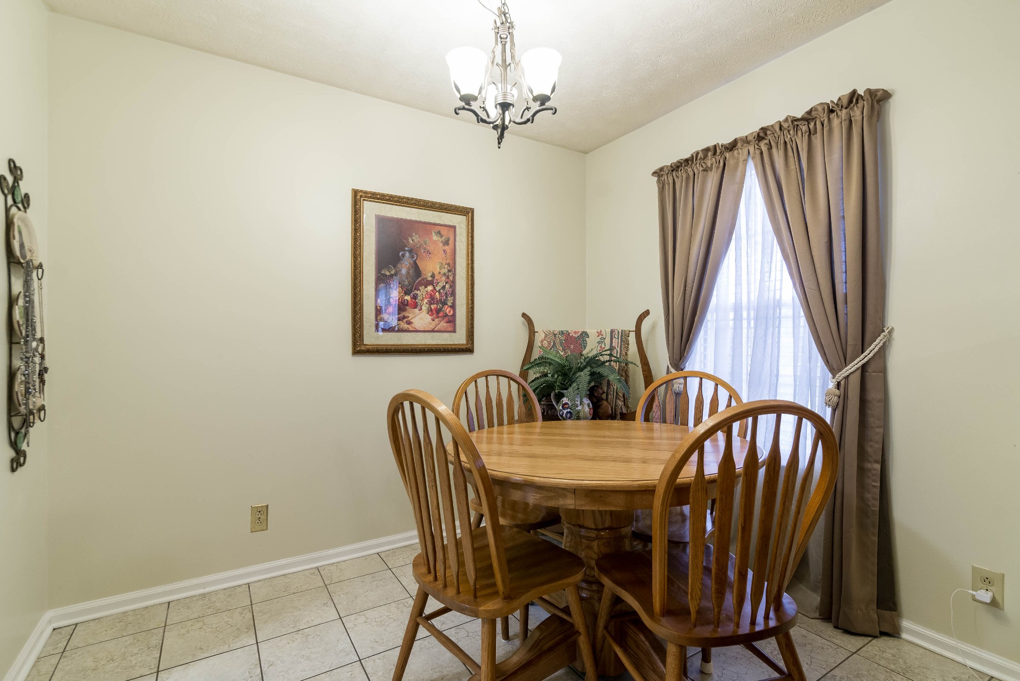 104 Brookside Point Springfield, TN 37172 - Photo 9 of 28 a view of a dining room with furniture and window