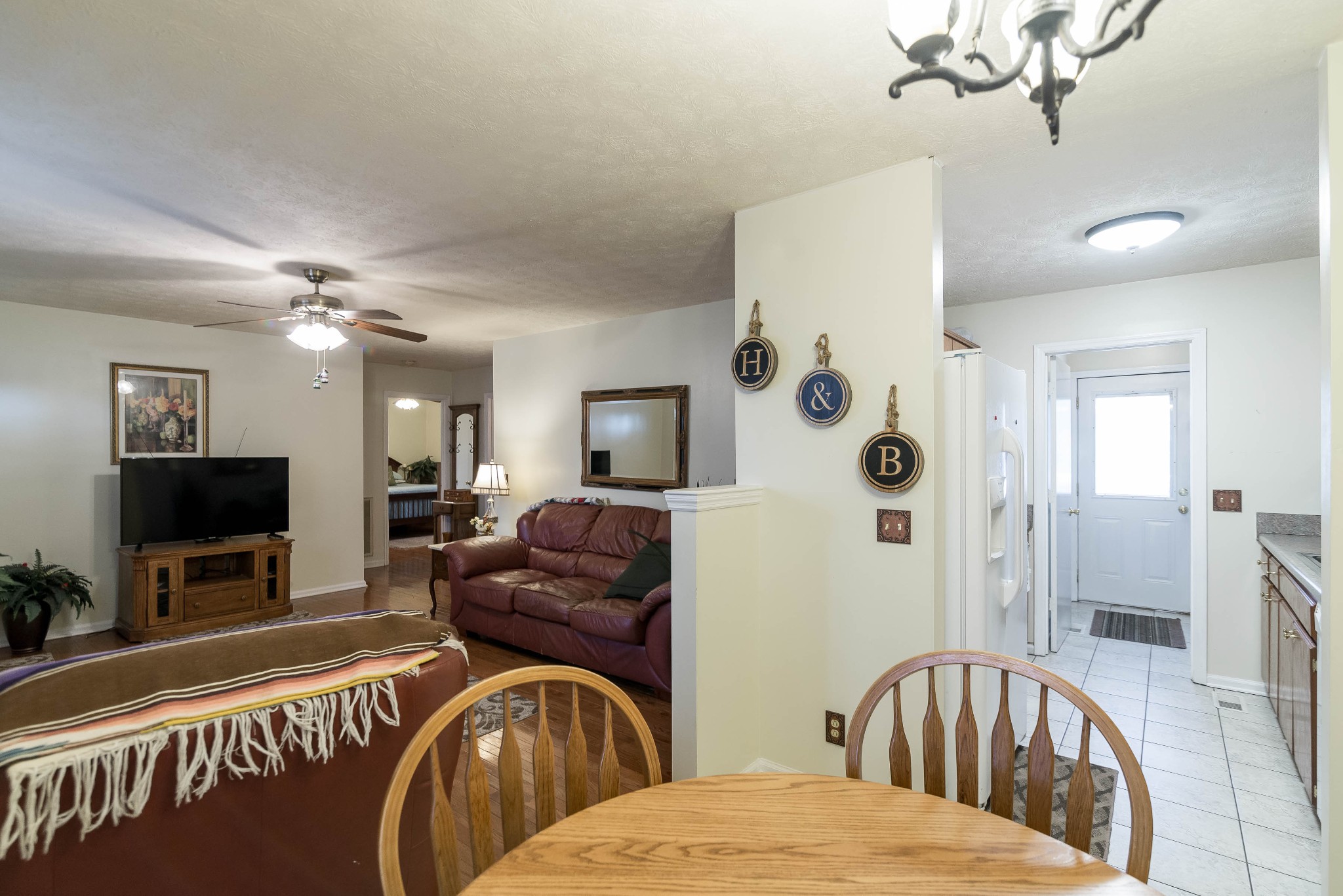 104 Brookside Point Springfield, TN 37172 - Photo 10 of 28 a living room with furniture and a flat screen tv