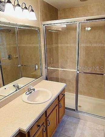 96 Redwood Road Ocala, FL 34472 - Photo 9 of 10 a bathroom with a sink and a mirror