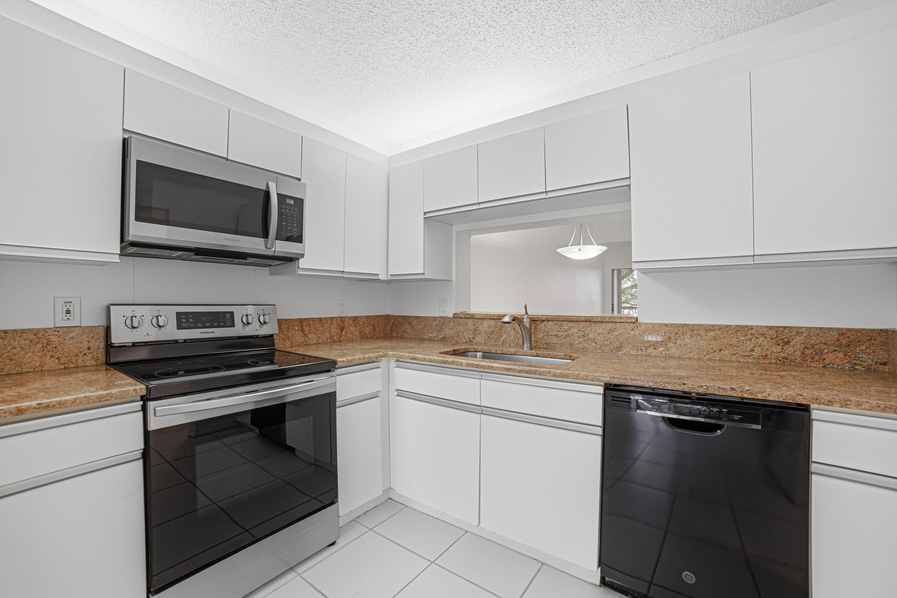 260 Northwest 67th Street, Unit A203 Boca Raton, FL 33487 - Photo 6 of 25 Kitchen-C