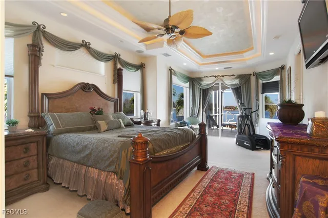 a bed room with a bed and a chandelier