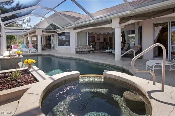 a view of a kitchen with furniture and a table