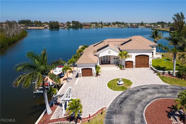 an aerial view of a house with outdoor space