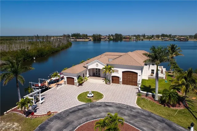 an aerial view of lake residential house with outdoor space