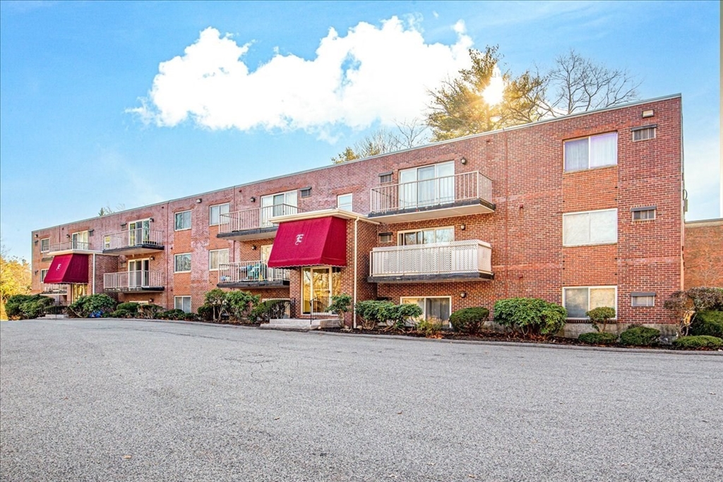 31 Hamlin Lane, Unit A14 Needham, MA 02492 - Photo 2 of 23 a view of a building with a street