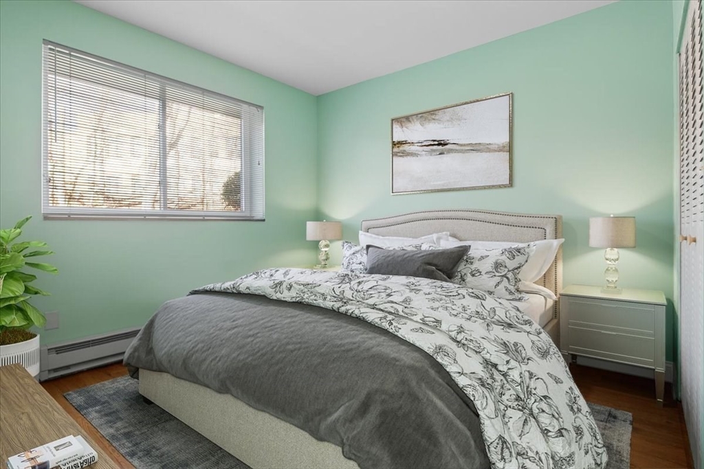 31 Hamlin Lane, Unit A14 Needham, MA 02492 - Photo 22 of 23 a bedroom with bed and window