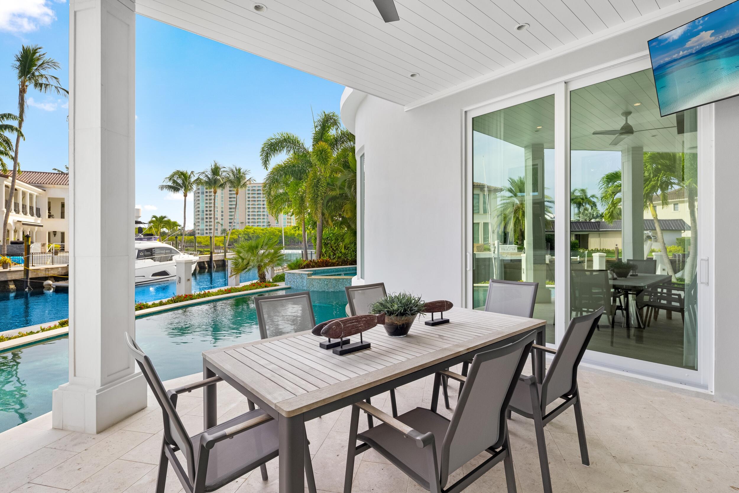 863 Enfield Street Boca Raton, FL 33487 - Photo 21 of 67 a view of a dining room with furniture window and outside view