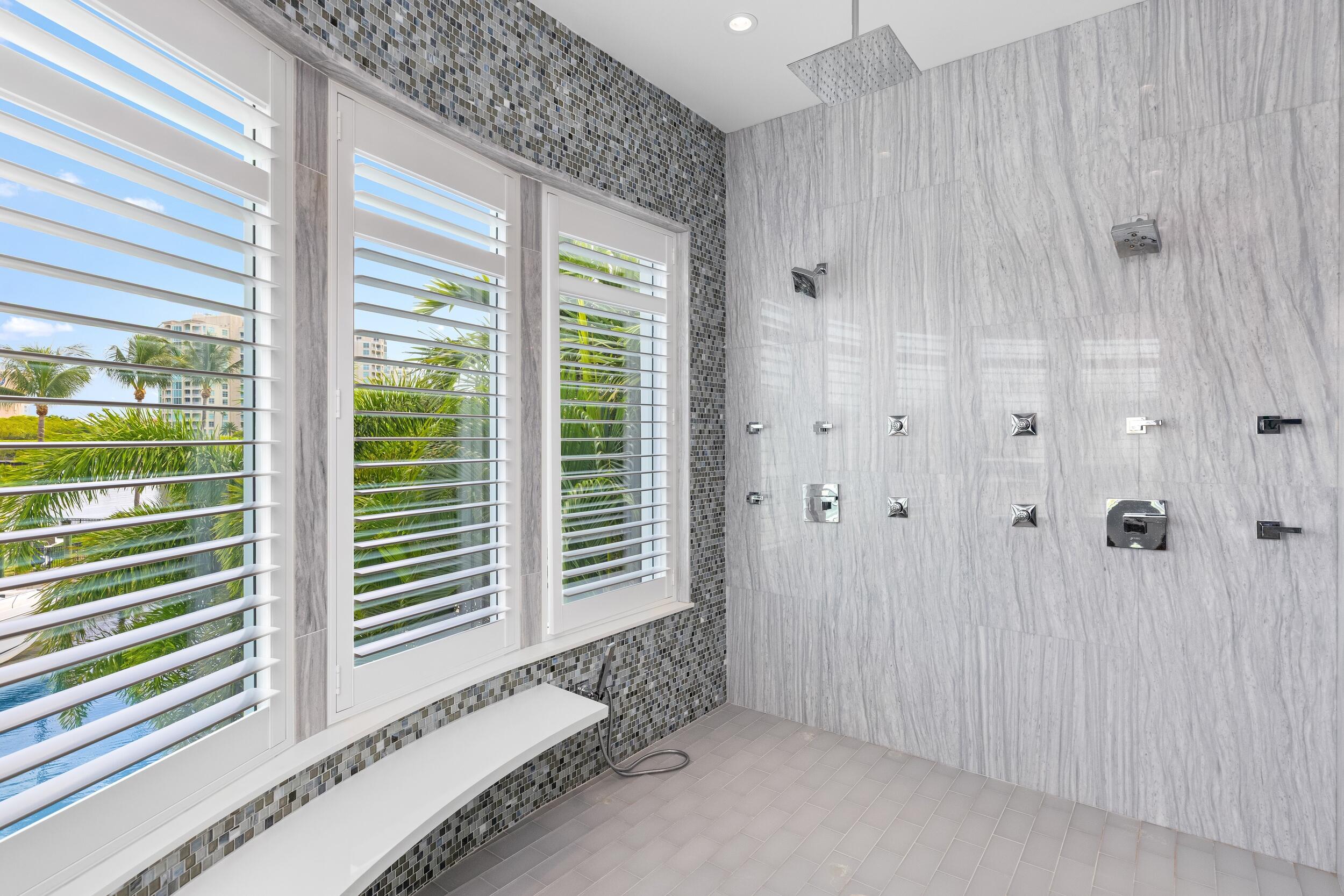 863 Enfield Street Boca Raton, FL 33487 - Photo 47 of 67 a view of a room that has a large window and a wooden door