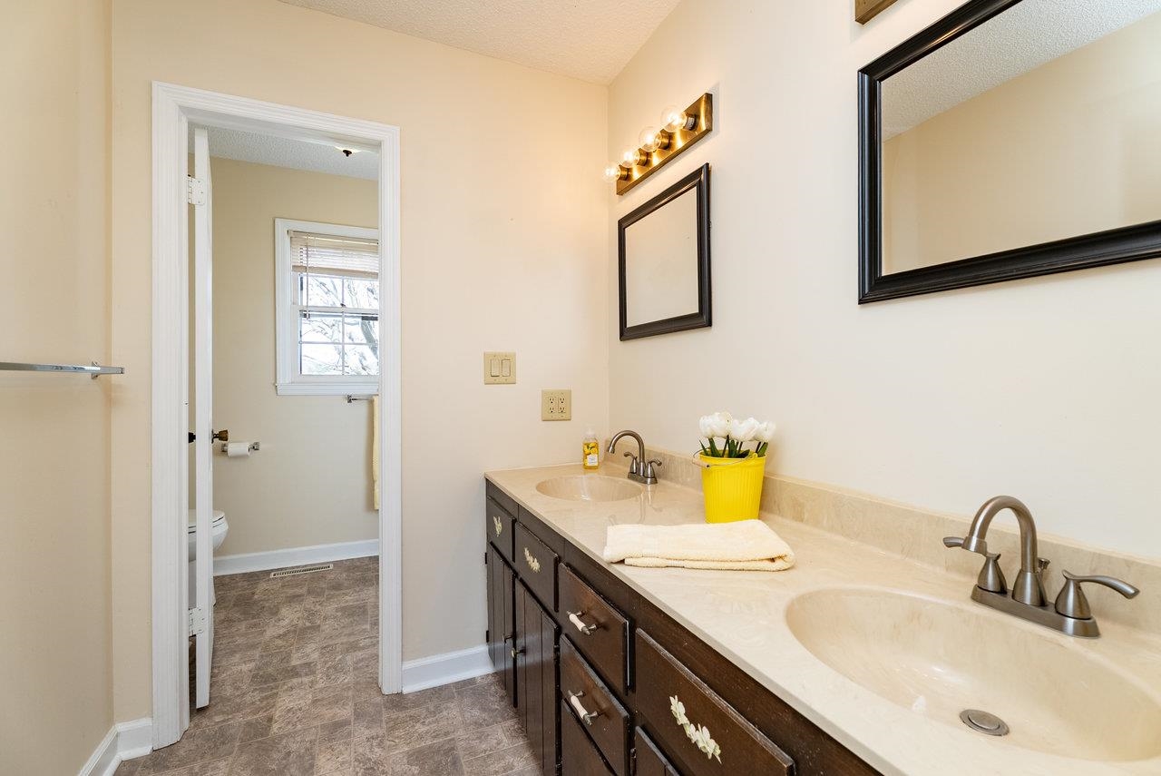 456 Eckert Circle Harrisonburg, VA 22801 - Photo 23 of 48 a bathroom with a sink and a mirror