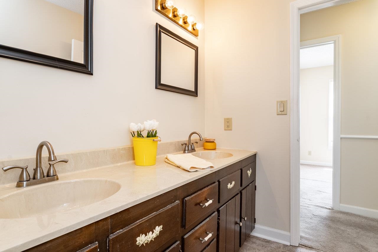 456 Eckert Circle Harrisonburg, VA 22801 - Photo 25 of 48 a bathroom with a sink and a mirror