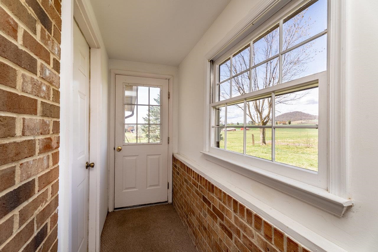 456 Eckert Circle Harrisonburg, VA 22801 - Photo 34 of 48 a view of hallway with a large window and front door
