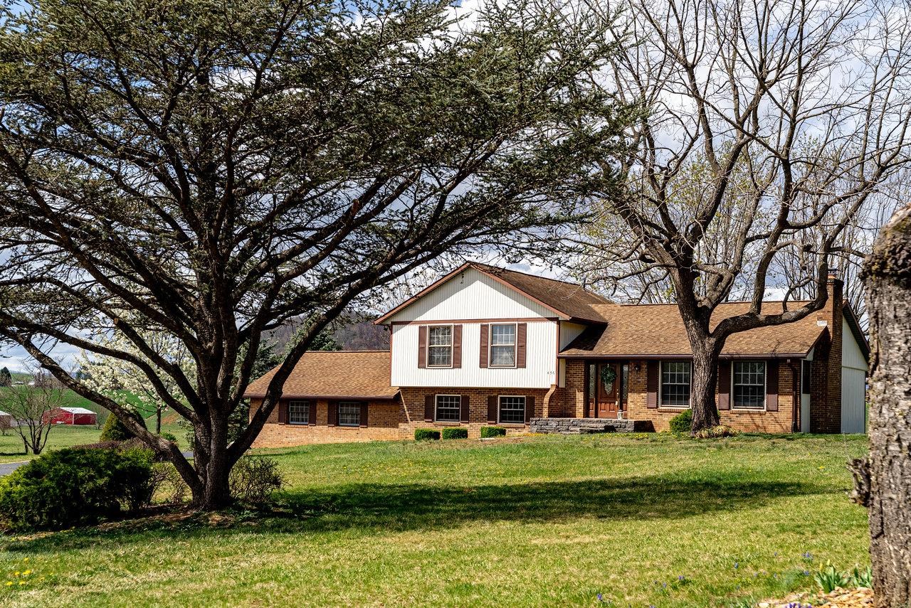 456 Eckert Circle Harrisonburg, VA 22801 - Photo 36 of 48 a front view of a house with a garden and trees