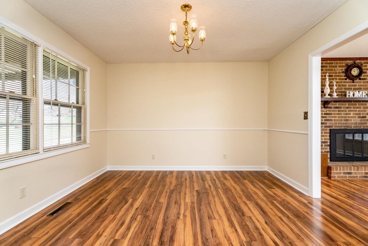 456 Eckert Circle Harrisonburg, VA 22801 - Photo 9 of 48 a view of a room with wooden floor and a window