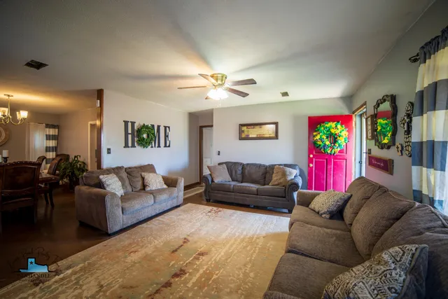 a living room with furniture and a couch