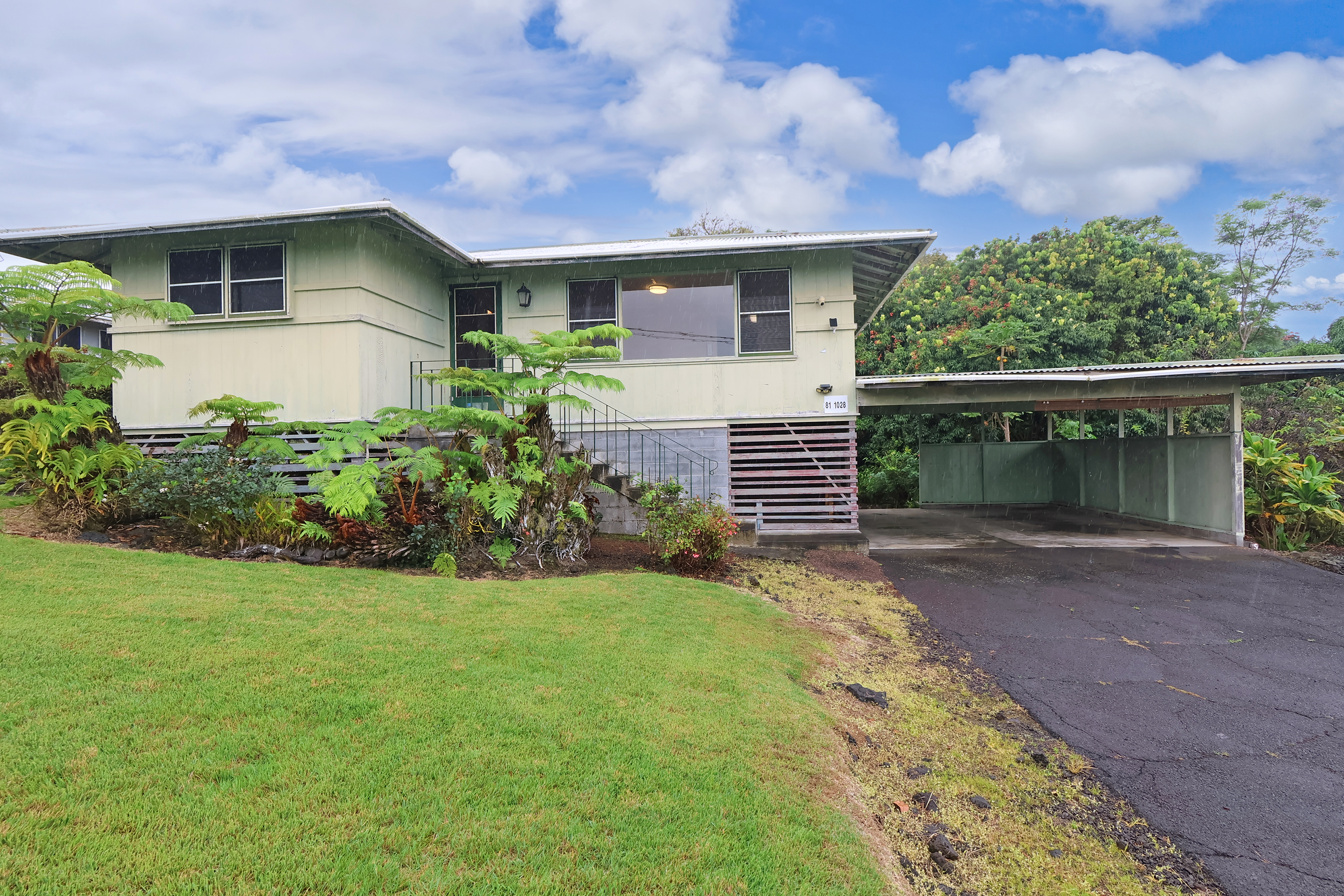 a front view of house with yard