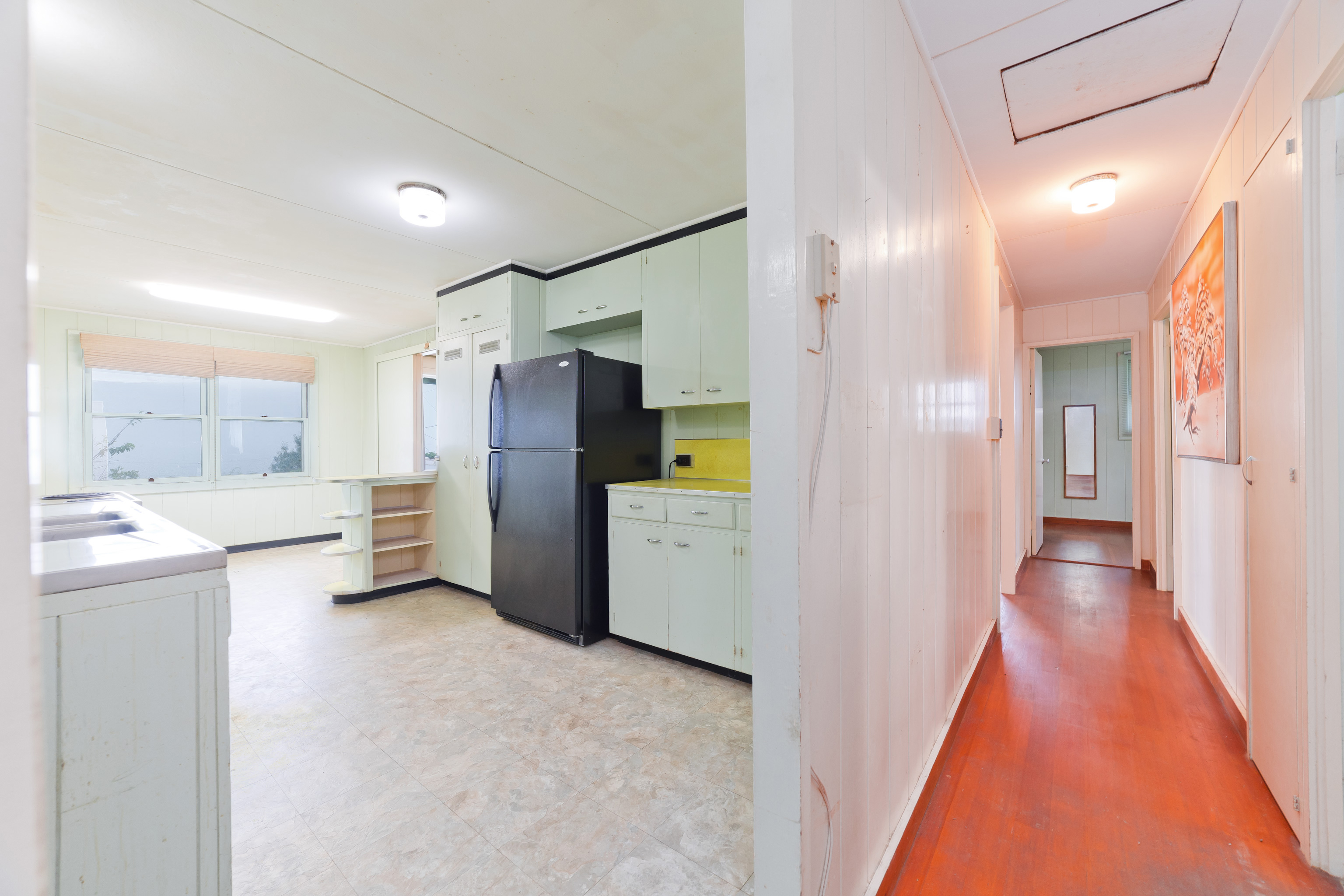 81-1028 Captain Cook Road Captain Cook, HI 96704 - Photo 13 of 22 a view of a refrigerator in kitchen and a sink