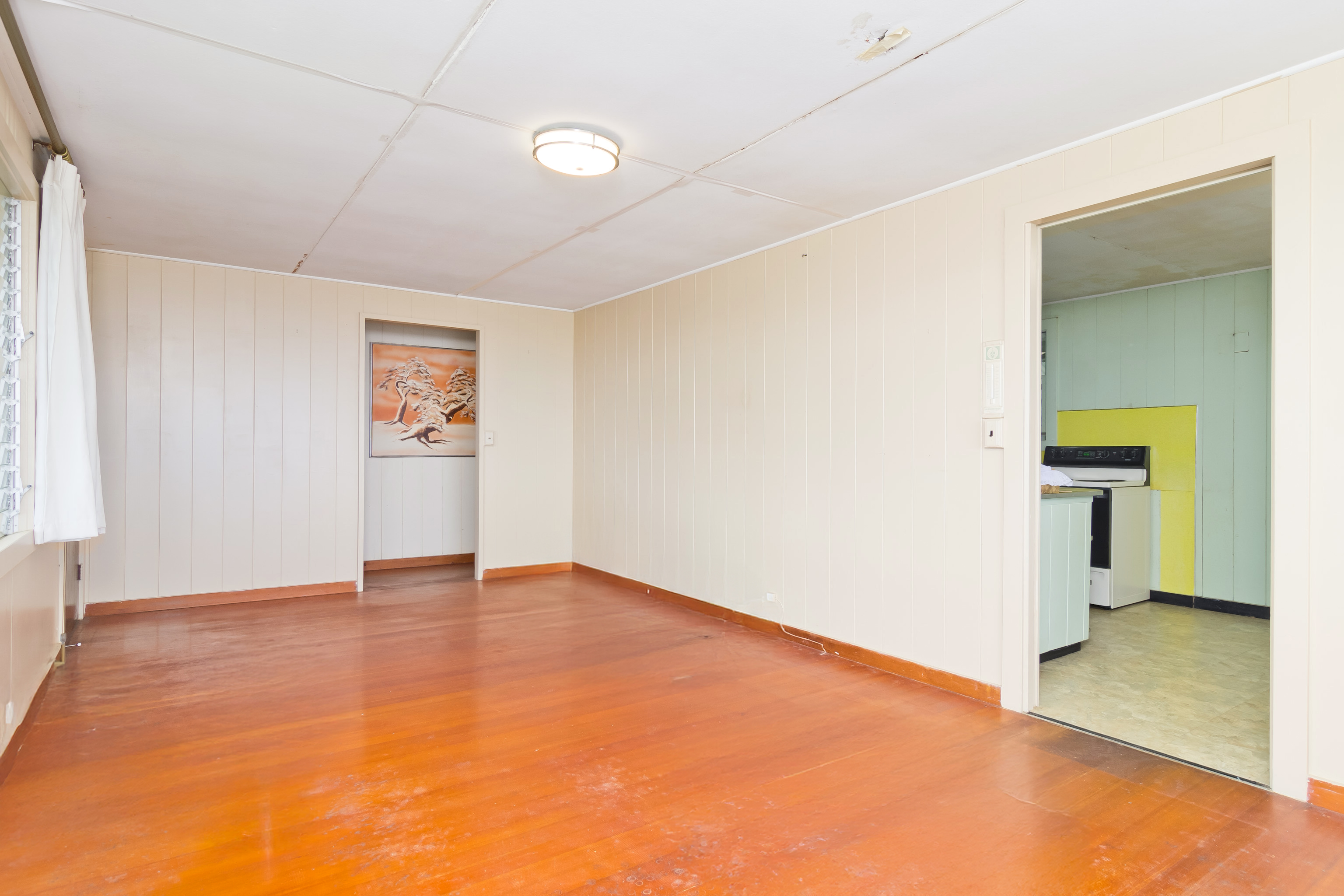 81-1028 Captain Cook Road Captain Cook, HI 96704 - Photo 5 of 22 a view of an empty room with a window