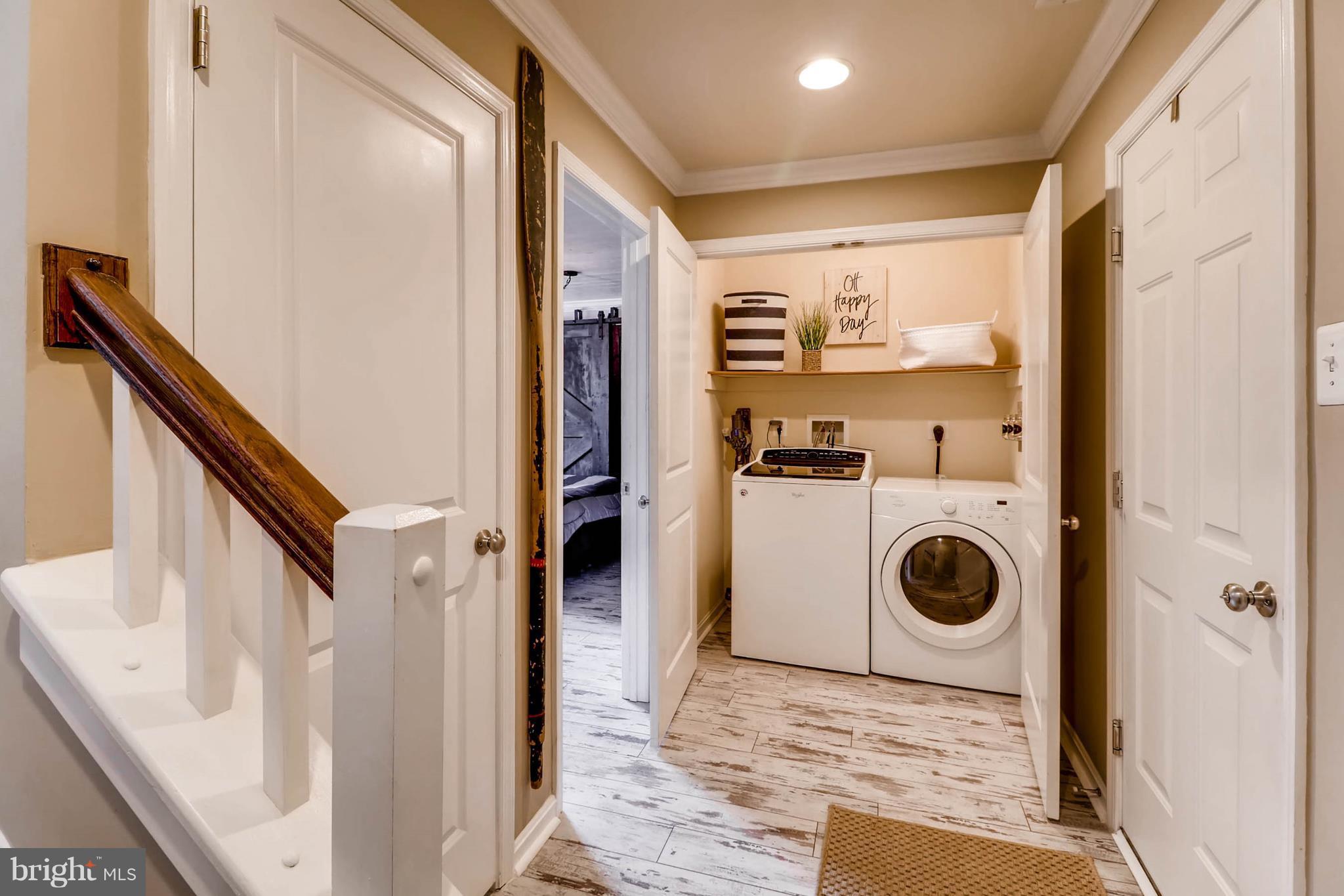 2033 Case Road Baltimore, MD 21222 - Photo 22 of 30 a view of a hallway with washer and dryer