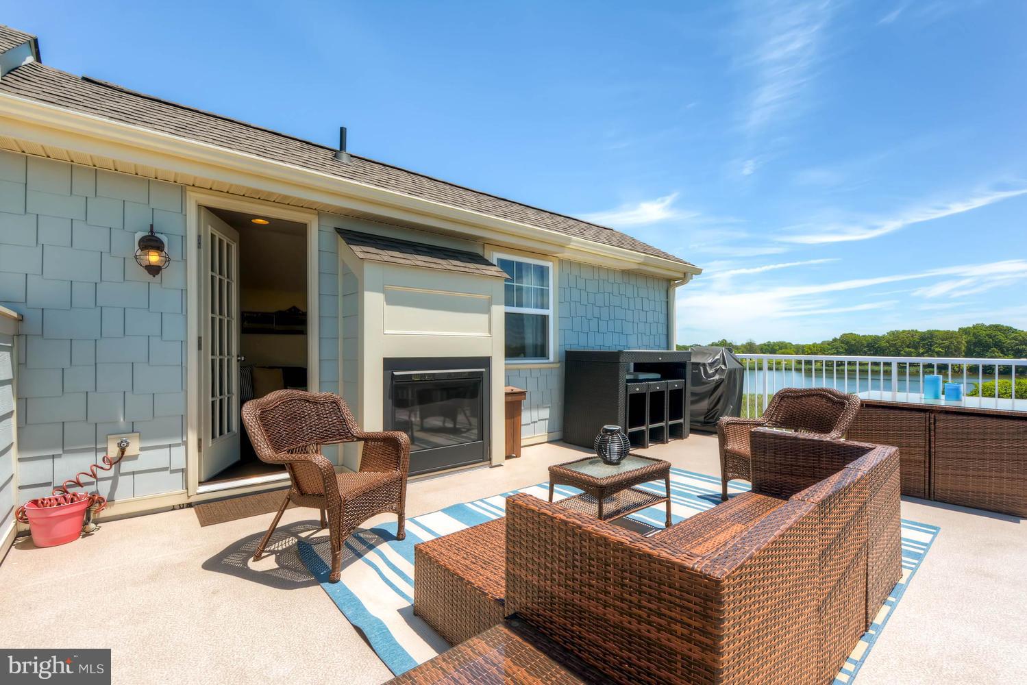 2033 Case Road Baltimore, MD 21222 - Photo 26 of 30 a view of a patio with couches and a table
