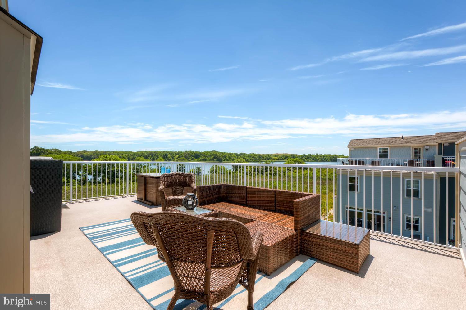 2033 Case Road Baltimore, MD 21222 - Photo 28 of 30 a balcony with furniture and city view