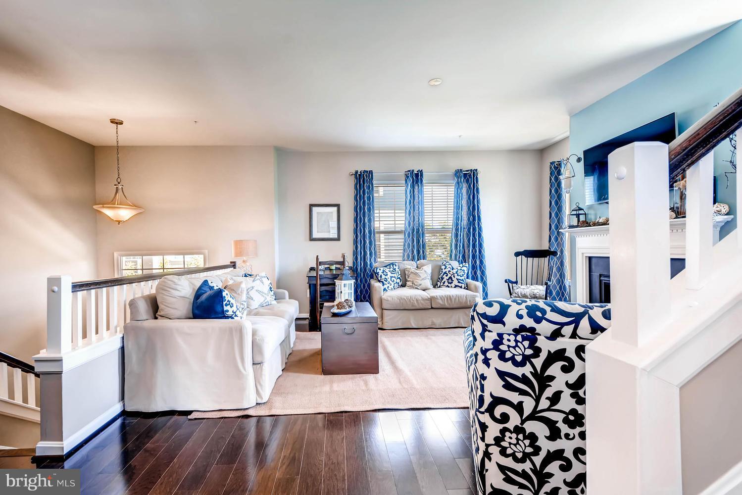 2033 Case Road Baltimore, MD 21222 - Photo 6 of 30 a living room with furniture and wooden floor