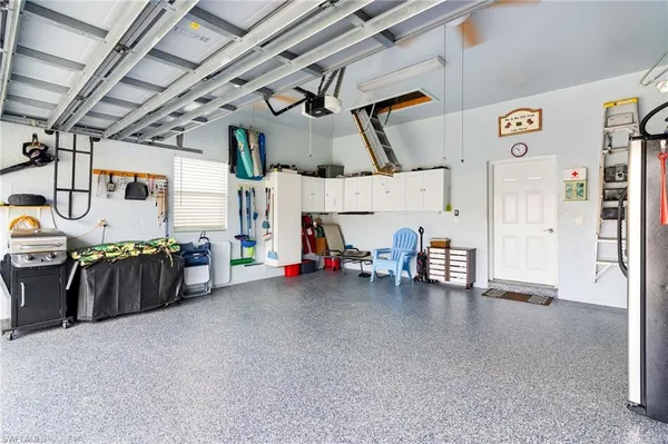 a view of a garage with furniture