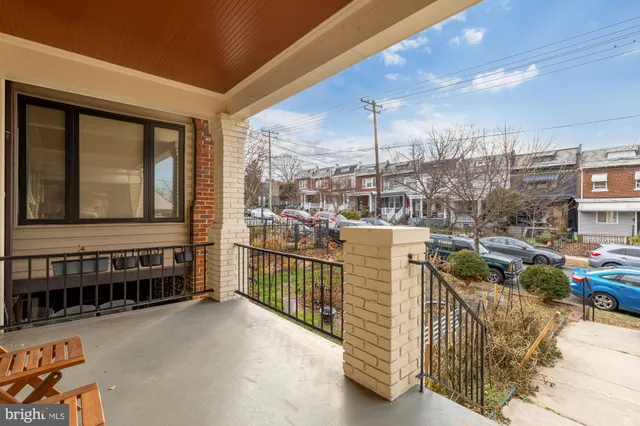 a view of a balcony with furniture