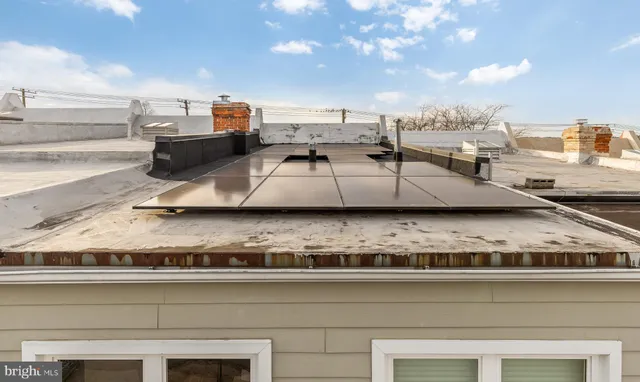 a view of a living room with furniture