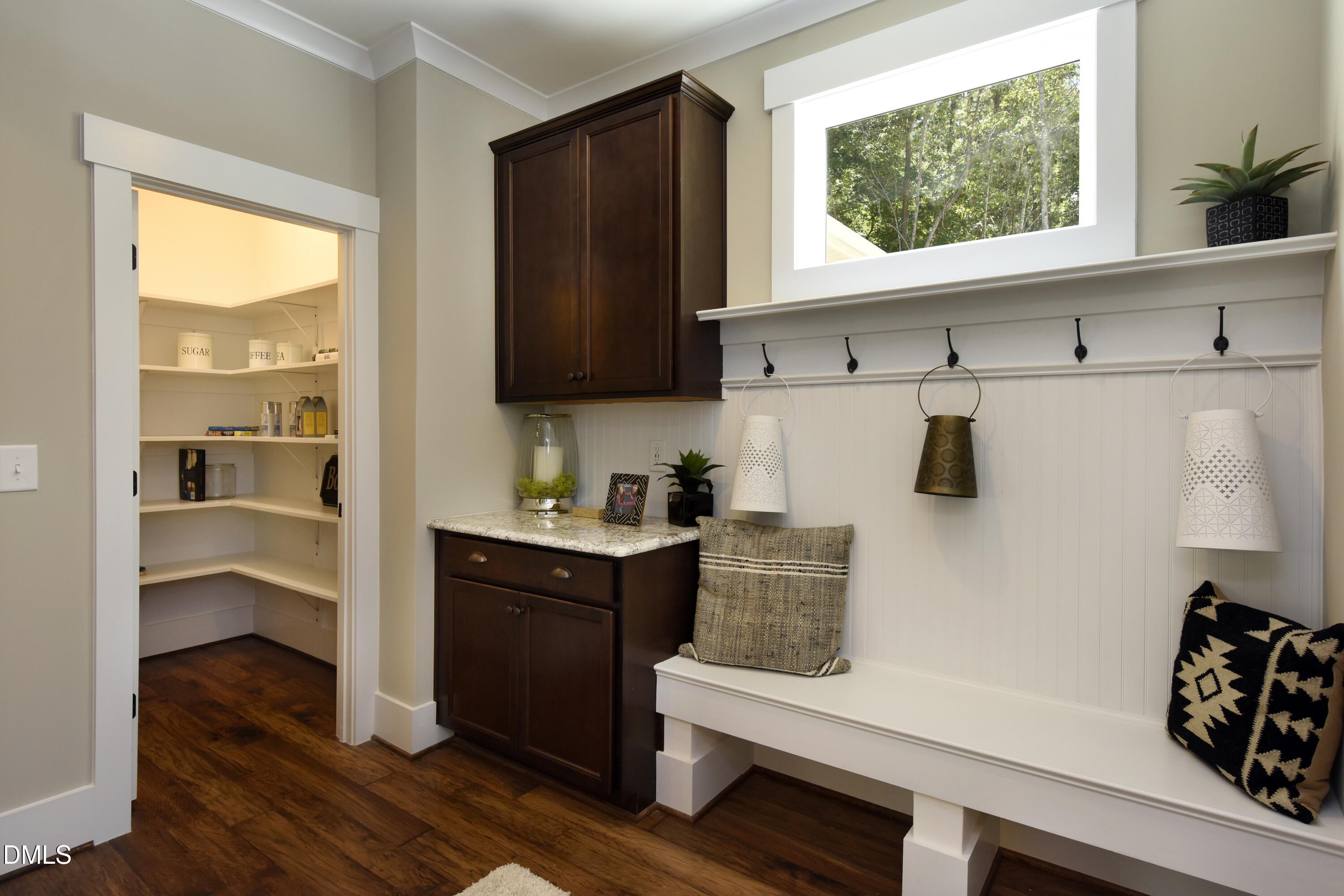 4 Wolf Tree Way Efland, NC 27243 - Photo 8 of 28 a kitchen with stainless steel appliances a sink a stove and a window