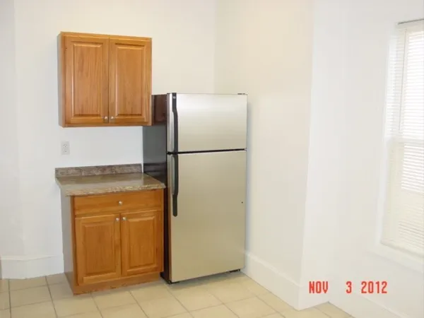 a hallway with sliding door and yard in back
