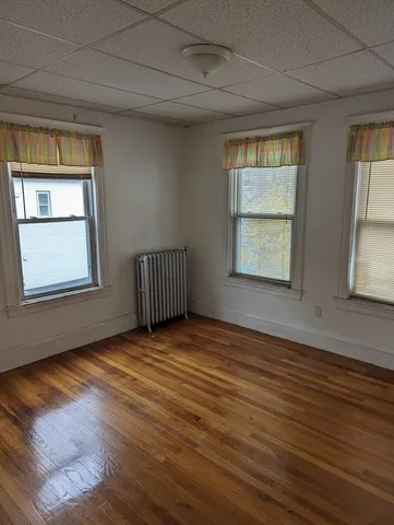 a view of a door and a window