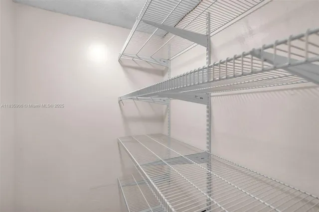 a view of a room with racks on the wall