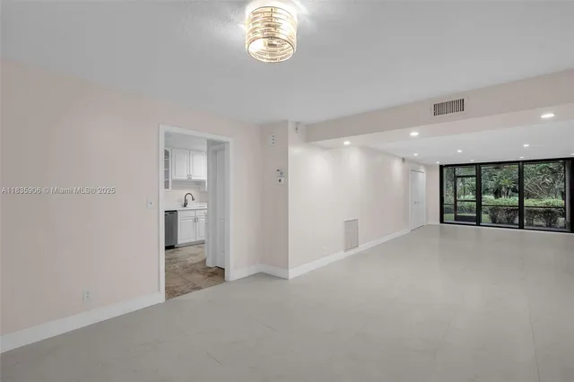 a view of empty room with a window