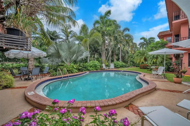 a view of a garden with a tree