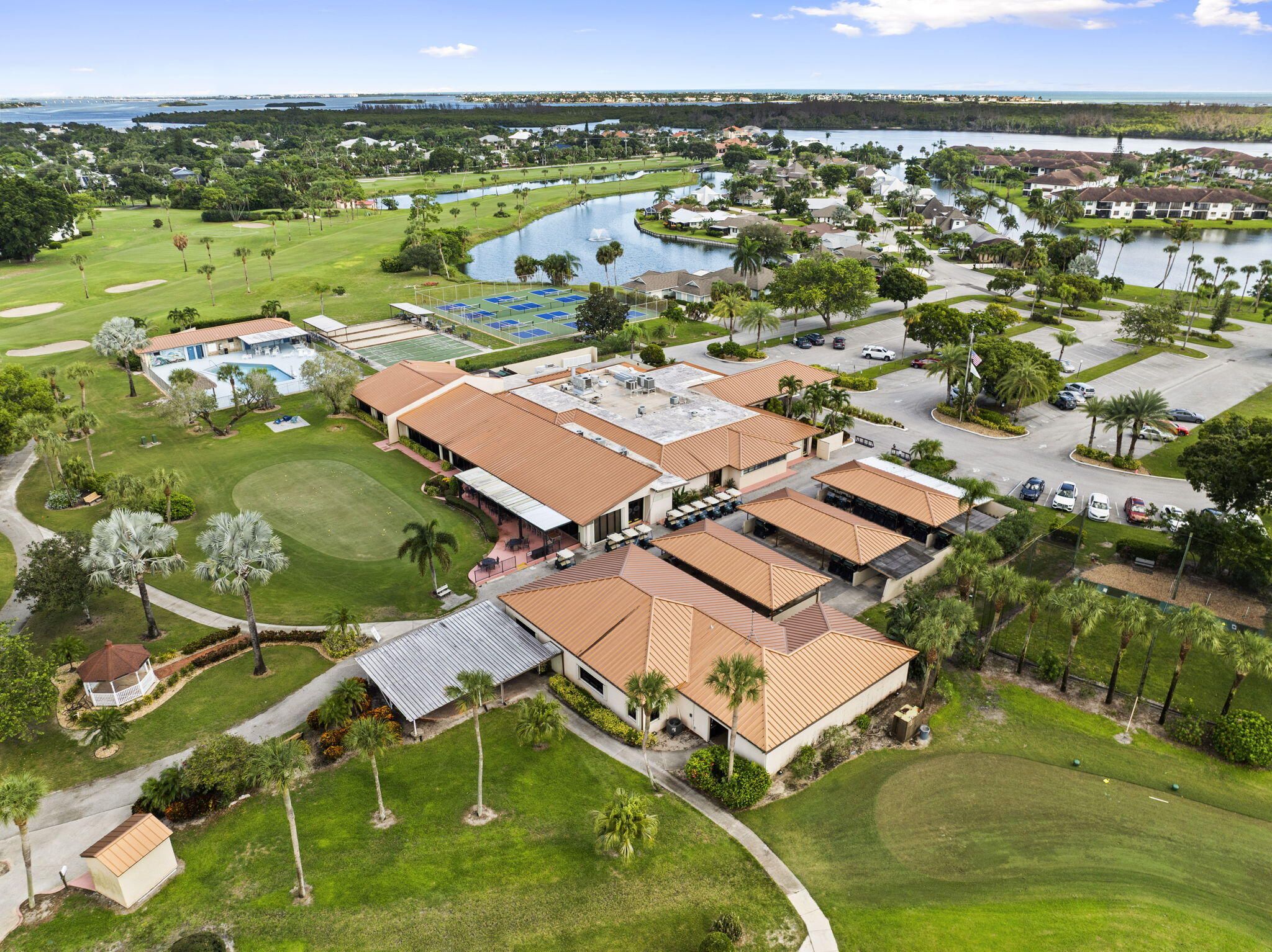 5413 Southeast Miles Grant Road, Unit G206 Stuart, FL 34997 - Photo 23 of 31 an aerial view of residential houses with outdoor space