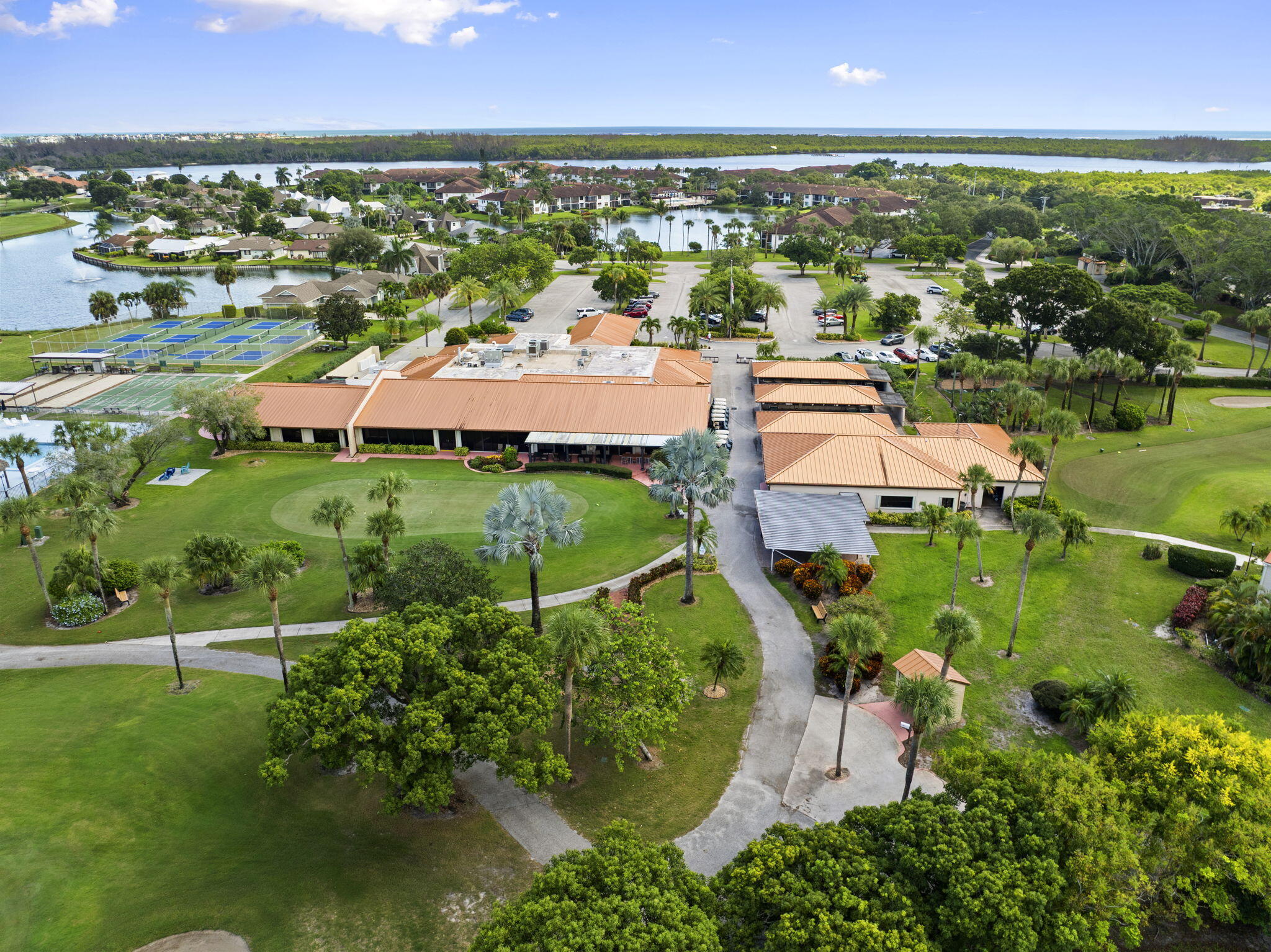 5413 Southeast Miles Grant Road, Unit G206 Stuart, FL 34997 - Photo 24 of 31 an aerial view of residential houses with outdoor space and river