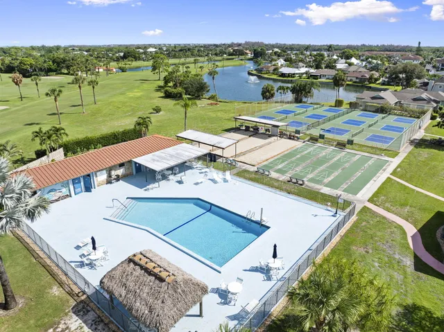 an aerial view of a house with a garden