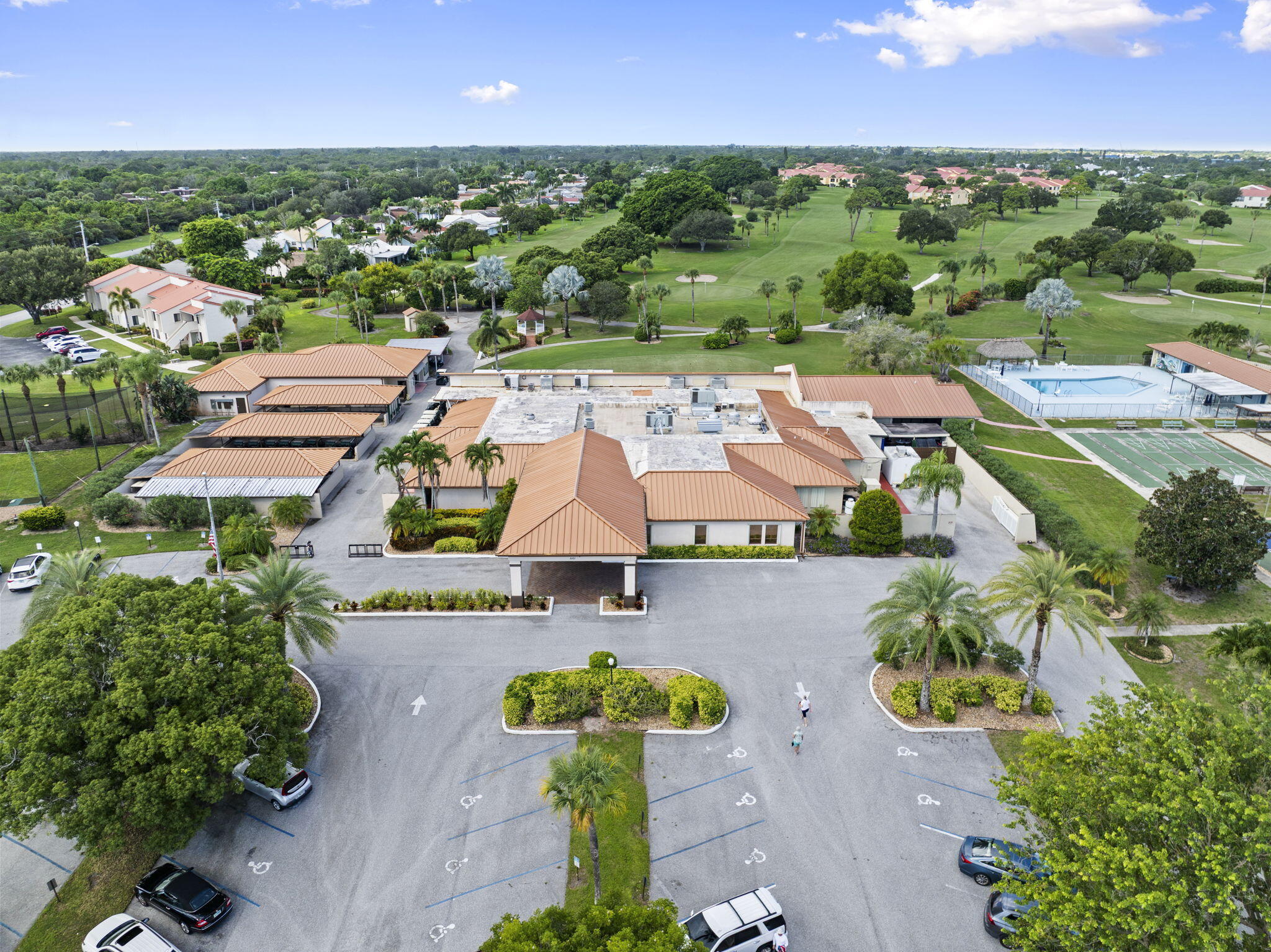 5413 Southeast Miles Grant Road, Unit G206 Stuart, FL 34997 - Photo 27 of 31 an aerial view of a house with a garden