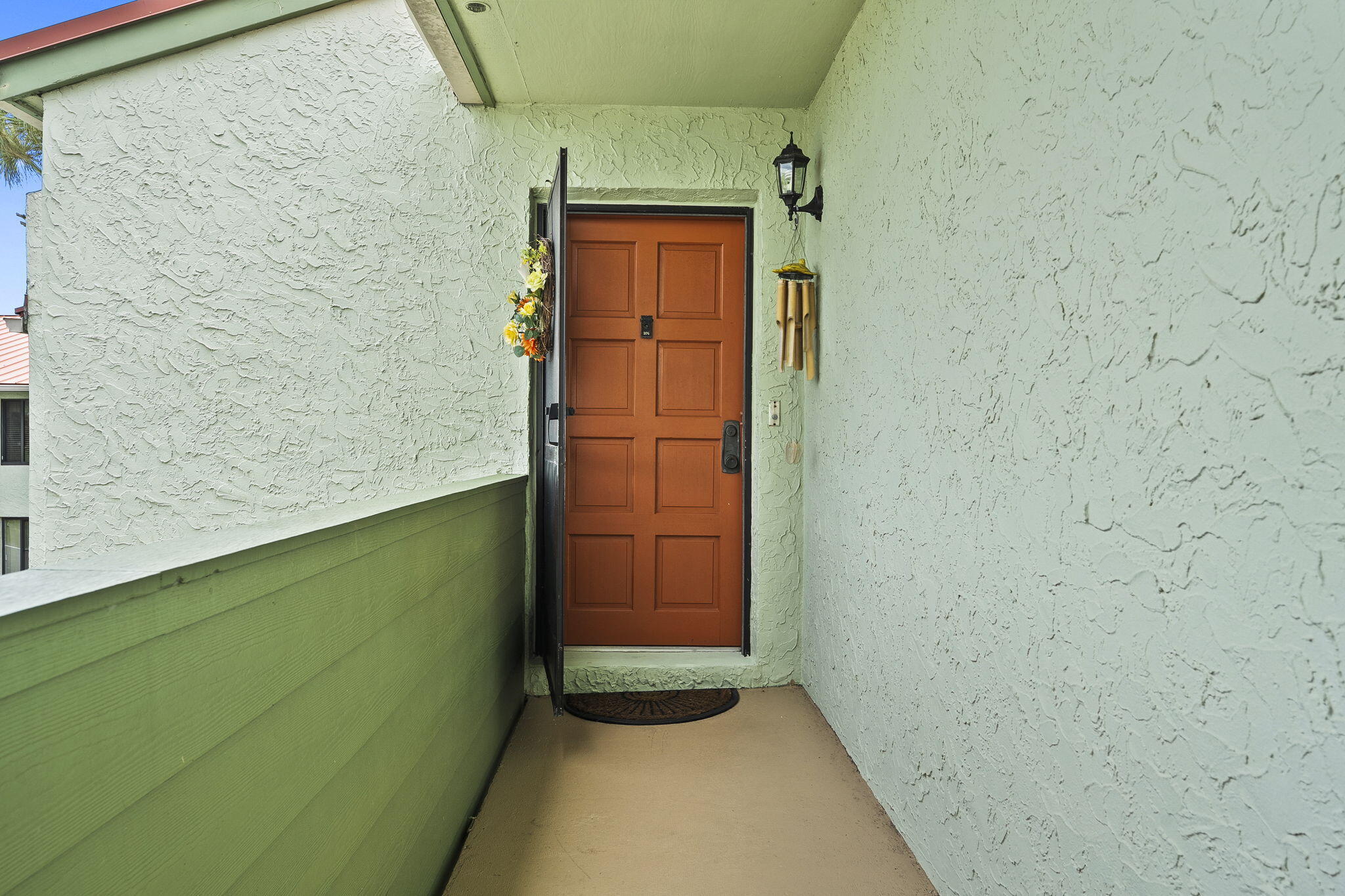 5413 Southeast Miles Grant Road, Unit G206 Stuart, FL 34997 - Photo 3 of 31 a view of front door